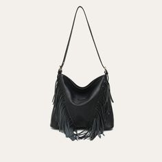 Discover Elegant Style and Functionality Embrace the perfect blend of fashion and practicality with our Luxurious Vegan Leather Tassel Shoulder Bag. Designed for the modern woman, this versatile hobo crossbody handbag is a must-have accessory for any wardrobe. Made from high-quality PU vegan leather, this bag is not only stylish but also ethically conscious. The elegant tassel decoration adds a bohemian touch, making it ideal for both casual and formal occasions. Key Features Material: High-grade PU Vegan Leather Spacious Interior: Includes a zipper pocket and a slot pocket Convenient Exterior: Features a back zipper pocket for easy access Secure Closure: Reliable zipper to keep your belongings safe Single Shoulder Strap: For comfortable carrying as a shoulder or crossbody bag Size: Genero Fall Hobo Shoulder Bag With Zipper Closure, Fall Shoulder Hobo Bag With Zipper Closure, Fall Shoulder Bag For Errands, Trendy Fall Hobo Bag With Zipper Closure, Fall Hobo Bag With Zipper Closure For Errands, Trendy Satchel Bag With Fringe, Trendy Fall Satchel Hobo Bag, Trendy Fringe Satchel Bag, Trendy Fringed Satchel Bag