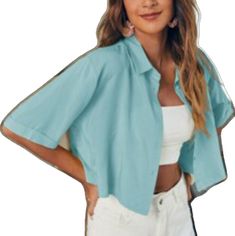 Chic Light Blue Top With Button Closure, Blue Solid Color Blouse For Day Out, Blue Solid Color Blouse For Beach, Blue Solid Color Beach Blouse, Trendy Light Blue Blouse For Vacation, Chic Light Blue Button-up Tops, Blue Cropped Shirt For Summer, Chic Light Blue Shirt For Summer, Blue Cropped Shirt For Spring