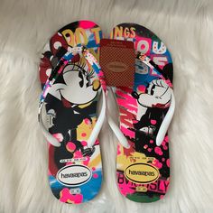 Havaianas Disney Minnie Mouse Flip Flop Sandals *New With Tags *Size 9/10 *Disney Minnie Mouse Printed Graphic *White Rubber Thongs Fun Non-slip Round Toe Flip Flops, Fun White Flip Flops For The Beach, Fun White Flip Flops For Beach, Fun White Flip Flops For Vacation, Playful Black Sandals For The Beach, Non-slip Playful Flat Flip Flops, Playful Non-slip Flat Flip Flops, Playful Adjustable Multicolor Flip Flops, Disney Summer Sandals With Round Toe