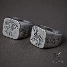 An Egyptian gods Anubis and Horus signet rings catch the eye and has meaning as a piece of jewelry showing ancient Egyptian gods. Made with fine details, it honors the deep stories and past of Egypt becoming a fashionable and important accessory. ◾️ SPECIFICATIONS ◾️ Material: 316 Stainless Steel Type: Handmade Signet Ring Durable: Anti-scratch / Waterproof / No Rust / No Tarnish Warranty: 2 years TRANSLATE with x English Arabic Hebrew Polish Bulgarian Hindi Portuguese Catalan Hmong Daw Romanian Symbolic Formal Jewelry With Etched Details, Formal Symbolic Etched Jewelry, Ceremonial Symbolic Hand Cast Rings, Symbolic Signet Ring As Gift, Symbolic Metal Jewelry For Formal Occasions, Symbolic Jewelry With Engraving Option For Formal Occasions, Symbolic Ceremonial Jewelry With Engraving Option, Symbolic Ceremonial Etched Jewelry, Ceremonial Symbolic Etched Jewelry