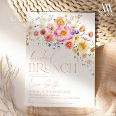 the bridal brunch is set on top of a table next to a wicker basket