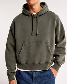 Elevate your casual wardrobe with the Abercrombie & Fitch Men's Essential Cropped Popover Hoodie. This piece combines comfort with contemporary style, perfect for any laid-back occasion.

- **Size:** XL
- **Color:** Dark Olive Green
- **Material:** Cotton, Polyester blend
- **Gender:** Male
- **Features:** Oversized, cropped fit; softAF fabric; exterior drawcords; front pouch pocket; banded hem and cuffs

Crafted in a unique dark olive green, this hoodie is made from a soft cotton-polyester blen Relaxed Fit Fleece Hoodie With Drop Shoulder, Relaxed Fit Sweatshirt With Kangaroo Pocket And Drop Shoulder, Relaxed Fit Drop Shoulder Sweatshirt With Kangaroo Pocket, Cotton Sweatshirt With Drawstring Hood And Drop Shoulder, Relaxed Fit Cotton Hoodie With Drop Shoulder, Cotton Hoodie With Relaxed Fit And Drop Shoulder, Cotton Relaxed Fit Hoodie With Drop Shoulder, Soft-washed Relaxed Fit Hoodie For Streetwear, Soft-washed Hoodie With Relaxed Fit For Streetwear