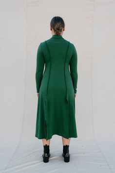 [meet me by our favorite fountain after two]Strut your stuff! The Ada in forest green is a long-sleeved, mock neck dress that is figure-hugging at the top and relaxed fitting from the waist down; with inviting two-way slits. This dress gives you a comfortable fit in all the right places, highlighting exposed seams with a stretch that is oh so cozy! •Mockneck collar•Super flattering fit•Slits in front and back•Exposed seams•Super cozy stretchAmari is 5'9", dress size 10, wearing a size L. Elle is Exposed Seams, Mock Neck Dress, Large Bust, Small Bust, Fit In, Forest Green, The Struts, Mock Neck, Vintage Shops