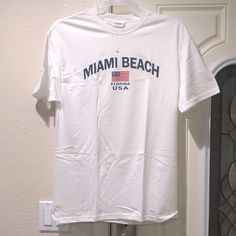 Brand New - Unworned Graphic Miami Beach T-Shirt. Size Large. White Summer T-shirt With Text Print, White Tops For Streetwear During Beach Season, White Tops For Beach Season Streetwear, White Crew Neck T-shirt For Beach Season, White Screen Print T-shirt For Beach Season, White T-shirt With Screen Print For Beach Season, White T-shirt With Text Print For Vacation, White Casual T-shirt For Beach Season, Casual White T-shirt For Beach Season