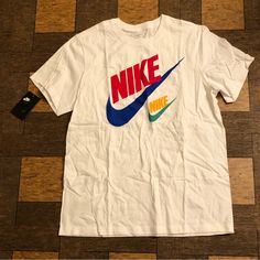 Brand New With Tags Nike Trademark Icon Logo Short Sleeve T-Shirt Item Is Brand New And Has Never Been Worn Or Used No Scratches, Scuffs Or Snags Size L Color Yellow Nike Sporty Top With Logo, Sporty Nike Top With Logo, Nike Cotton Top With Logo, Nike Cotton Tops With Logo, Casual Sports Shirt For Spring, Casual Sports Polo Shirt, Casual Sports Shirt With Graphic Print, Spring Sports Cotton Shirt, Nike White Cotton Shirt