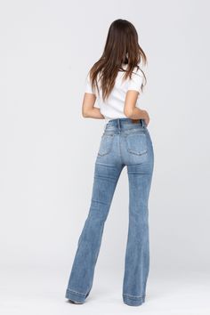 Introducing the Jesse Mid Rise Flare Jeans! These stylish jeans are just what you need to take your outfit to the next level. With a medium-wash and mid-rise fit, these jeans will hug your curves for the perfect look. Add some flare to your wardrobe today! 66% Cotton, 12% Rayon, 21% Polyester, 1% Spandex Inseam: 33" Rise: 10" Blue Flare Jeans, Mid Rise Flare Jeans, Looks Country, Bleach Product, Buy Jeans, Blue Trousers, Judy Blue Jeans, Trouser Style, Plus Size Pants