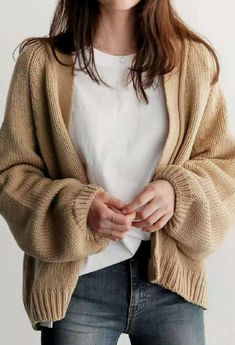 Casual Beige Solid Color Cardigan, Winter Knitted Cotton Cardigan, Casual Knitted Sweater Coat, Trendy Warm Long Sleeve Cardigan, Casual Long Sleeve Knit Outerwear, Warm Casual Sweater For Spring, Brown Cotton Cardigan For Winter, Casual Cotton Chunky Knit Outerwear, Chunky Knit Cotton Outerwear For Fall