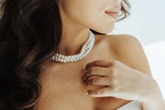 Embrace the elegance of a bygone era with our Pearl Choker. The perfect finishing touch to any bridal look, this vintage-inspired piece exudes Bridgerton vibes. Adorned with luxurious faux pearls, it adds a touch of sophistication and charm. Elevate your style with this must-have accessory. Details: Faux Pearls Final Sale Bridgerton Vibes, Final S, Bygone Era, Bridal Look, Pearl Choker, Off White Color, Bridal Shop, Modern Bride, Bridal Hair Accessories