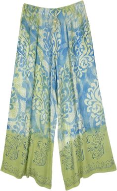 A pair of beach-inspired super comfy wide-leg pants with sea-green and sea-blue tie-dye and floral prints. The prints merge into each other, creating a fascinating look. #tlb #SplitSkirtsPants #beachwrap #Floral #Printed #WideLegPants #BeachPants #CasualPants #HippiePants Spring Green Printed Wide Leg Pants, Spring Printed Green Wide Leg Pants, Casual Green Printed Wide Leg Pants, Green Printed Beach Pants, Printed Wide Leg Pants For Beach In Spring, Spring Beach Printed Wide Leg Pants, Spring Beach Wide Leg Printed Pants, Green Wide Leg Pants For Summer Vacation, Flowy Green Bottoms For Spring