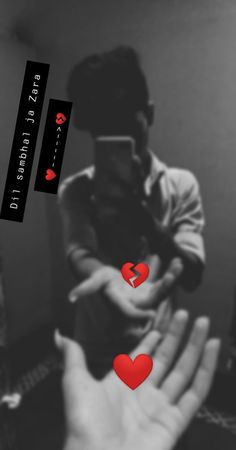 two hands reaching out towards each other with red hearts in the middle and black text on them