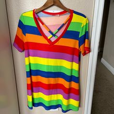 Very Colorful V Neck Long Tee. Never Worn But No Tags. Bought From Zulily. Medium But Runs Big. Would Make A Cute Early Trimester Maternity Top. Smoke Free Home. Multicolor V-neck T-shirt For Vacation, Multicolor Rainbow Print Tops For Spring, Multicolor Rainbow Print T-shirt For Spring, Summer Multicolor Stretch T-shirt, Stretch Multicolor T-shirt For Summer, Trendy Multicolor Tops With Rainbow Print, Fitted Rainbow Short Sleeve Tops, Vibrant Yellow Short Sleeve Tops, Colorful Cotton V-neck Tops