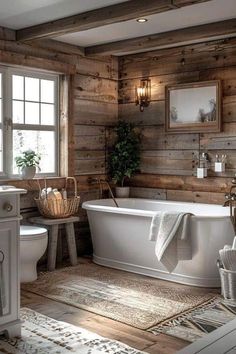 a rustic bathroom with wood walls and flooring