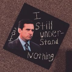 a graduation cap with the words i still under stand nothing written on it in white chalk