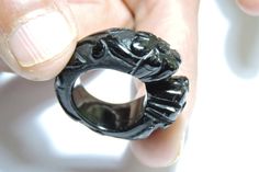 Buyer Will Receive 1 Piece Gorgeous Natural Black Onyx Hand Carved Rajasthani Design Single Gemstone Made Ring. you will really love it.you will gift it to your love ones and friends. Product Details Product Name -Natural Black Onyx Gemstone Made Ring Gemstone - Natural Black Onyx Quantity - 1 Piece 100% Natural ----------------------------------------------------------------------------- THIS BEAUTIFUL ITEM IS AVAILABLE ONLY ON ETSY -------------------------------------------------------------- Black Carved Jewelry Gift, Black Carved Round Rings, Carved Black Rings As Gift, Carved Black Rings For Gift, Black Carved Ring Jewelry, Black Carved Round Jewelry, Rajasthani Design, Onyx Gemstone, Amethyst Quartz