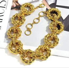 This chic chunky coil necklace is perfect to add a classy meets trendy appeal to your look. Style with a simple dress, jumpsuit or vacation look to give your style a chic, luxe vibe. Color: Yellow gold Chic Gold Chain Necklace, Chic Gold Plated Chain Necklace For Party, Elegant Chunky Necklaces For Parties, Chunky Gold Necklace For Party, Elegant Chunky Necklace For Parties, Chic Yellow Gold Necklace With Chunky Chain, Chic Chunky Gold Jewelry, Bold Chunky Gold Necklace, Luxury Chunky Link Necklaces