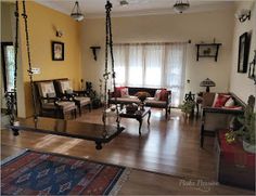 a living room filled with lots of furniture and decor