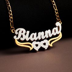 Details: This personalized double-layer two-tone name necklace features a heart pendant, expressing love and affection. Crafted from high-quality materials, it is durable, comfortable, and resistant to fading. Customize the name to make it unique, suitable for everyday wear or special occasions, and a perfect gift for loved ones. Key Points: 1. Personalized Design: Customize the name for a unique and individualized necklace, showcasing your personality. 2. Double-Layer Design: Double-layer chain Customized Gold Double Heart Necklace, Gold Double Heart Name Necklace, Gold Heart Nameplate Necklace, Gold Nameplate Heart Necklace, Gold Double Heart Name Necklace For Personalized Gift, Personalized Gold Name Necklace With Double Heart, Gold Double Heart Name Necklace As Personalized Gift, Personalized Gold Double Heart Name Necklace, Gold Double Heart Name Necklace For Mother's Day