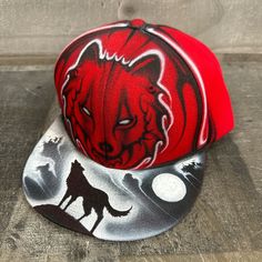 This is an airbrushed snapback hat featuring a red wolf design.  This hat is adjustable and will fit almost anyone.  These hats are waterproof and can withstand a good soaking but they should not be washed in a washing machine or dish washer.  Thank you, Brad.  Shipping is free for this item anywhere in the US. Red Hip Hop Fitted Hat For Streetwear, Red Hip Hop Snapback Hat, Red Hip Hop Snapback Hat For Streetwear, Red Hip Hop Fitted Hat With Flat Bill, Red Hip Hop Fitted Cap, Red Adjustable Hip Hop Fitted Hat, Red Fitted Hat For Streetwear, Red Flat Brim Fitted Hat For Outdoor, Red Snapback Baseball Cap For Outdoor