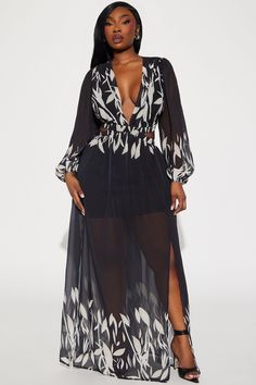 Available In Black/combo. Chiffon Maxi Dress Long Balloon Sleeves Deep V-Neckline Side Cut Outs Back Cut Out Half Lined Stretch Disclaimer Print Placement May Vary Self: 100% Polyester Lining: 100% Polyester Imported | Villa Vacation Chiffon Maxi Dress in Black size Small by Fashion Nova Chic V-neck Chiffon Beach Dress, Chiffon V-neck Dress For Beach Cover-up, Bohemian Sheer V-neck Maxi Dress, Beachwear V-neck Maxi Dress For Date Night, Chic V-neck Chiffon Dress For Date Night, Chic Black Chiffon Beach Dress, Chic Black Chiffon Dress For Beach, Chic V-neck Chiffon Dress, Black Chiffon Maxi Dress For Beach