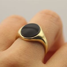 - 14k Yellow Gold- 100% Onyx (Size: 12mm*10mm)- All of our jewelry is handmade in our studio in the U.S. LEARN ABOUT OUR 14K GOLD JEWELRYKnown for its lasting quality, 14k Gold is found throughout our collection of Fine Jewelry. Whether framing 14k Gold earrings, necklaces, rings, or bracelets, this elevated metal is made to last for decades to come. Learn more about our favorite 14k Gold jewelry and how to properly care for your pieces.MEET OUR FINE JEWELRY STAPLEWhat is 14k Gold Made of?14k Go Timeless Onyx Signet Ring With Polished Finish, Timeless Black Enamel Signet Ring, Classic Onyx Signet Ring With Polished Finish, Modern Yellow Gold Onyx Signet Ring, Gold Onyx Rings With Polished Finish, 14k Gold Rings With Polished Finish And Round Stone, 14k Gold Ring With Polished Round Stone, 14k Gold Rings With Polished Round Stone, Black Ring With Polished Edges