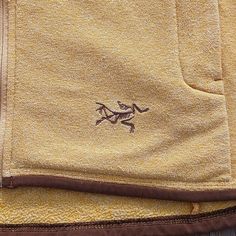 a close up of a towel with a horse on it