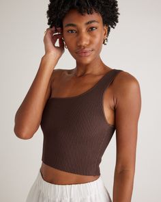 You found it, a flattering one-shoulder top that hugs in all the right places. Ottoman stitching gives our one shoulder sweater knit tank its structured style and textured feel with the perfect amount of stretch and softness for all-day comfort. Also available in a Halter, Square Neck, High Neck, and Polo silhouette. One Shoulder Sweater, One Shoulder Tank, Just Run, One Shoulder Tops, Knit Tank, Softest Sweater, Knitted Tank Top, Sweater Knit, Ribbed Sweater