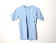 vintage Sky blue blank t shirt Made by Pro Club Size Small Across chest - 16 inches Length - 24 inches 100% cotton Made in the USA NL07 Basic Blue Crew Neck Sweatshirt, Light Blue Long Sleeve T-shirt For Streetwear, Light Blue Relaxed Fit Cotton Sweatshirt, Blue Relaxed Fit Basic Sweatshirt, Blue Basic Sweatshirt Relaxed Fit, Blue Cotton Crew T-shirt, Blue Cotton Crew Neck T-shirt, Blue Short Sleeve Sweatshirt For Streetwear, Light Blue Cotton Crew Neck Sweatshirt