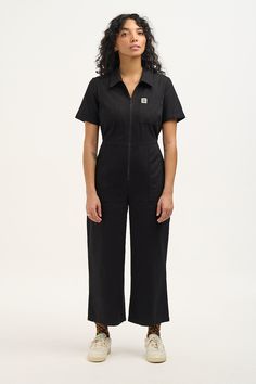 Ragan In Our Zip Front Short Sleeve Jumpsuit With A Wide Cropped Leg And Elasticated Back For Comfort Available Here In Black! Our Fit Short Sleeve With Fixed Turn Up Fitted Bodice With Back Elasticated Waist Channel Closer Fitting On The Hips With Wide Crop Length Leg Standard Collar With A Zip Opening At Front Chest Pocket, Deep Hip Pockets And Back Patch Pockets The Fabric 100% Cotton Twill - Made From Gots Certified Organic Cotton The Fabric Is Soft, Breathable And Durable Yak Care Machine W Lucy And Yak, Short Sleeve Jumpsuit, Comfy Clothing, Dungarees Shorts, Fitted Jumpsuit, Cotton Jumpsuit, Turn Up, Tee Dress, Hat Hairstyles