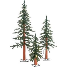 three christmas trees with lights on them are standing in front of each other, one is tall and the other is small