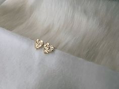 Golden Nugget Heart Earring! 1 set of Heart Earrings , with Gift Box Solid 14k gold, post earrings. Dimensions: 6.7mm x 6.5mm Diamond Cut finish for a radiant shine. Question? Please don't hesitate to contact me. *Wholesale or Custom* Wholesale: The more you buy, cheaper goes the price. Custom: Unique pieces to fit your very own style. (Different Color Gold) Contact Me for more information. Gold Heart-cut Earrings For Gift, Gold Heart Cut Earrings Gift, Gold Heart-shaped Earrings For Anniversary, Gold Heart-shaped Earrings For Anniversary Gift, Elegant Gold Heart Earrings For Anniversary, Gold Hypoallergenic Heart Cut Earrings, Hypoallergenic Gold Heart Cut Earrings, Rose Gold Tarnish-resistant Heart Earrings For Gift, Golden Nugget