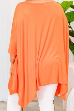 Every minute you spend in this top will be a amazing! This top is designed with a flattering fit and crafted from an orange hue! It has a flowy fit that pairs effortlessly with skinnies or leggings to create a classic, chic look! 95% Rayon, 5% Spandex Versatile Solid Color Tops For Loungewear, Casual Stretch Orange Blouse, Casual Orange Stretch Blouse, Stretch Orange V-neck Top, Orange Flowy Top For Summer, Orange Stretch V-neck Top, Flowy Orange Summer Top, Versatile Oversized Solid Color Top, Short Sleeve Orange Top For Loungewear