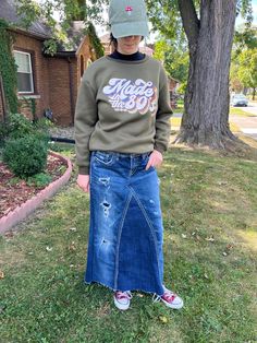 Long upcycled jean skirt. Size approximately 6/8.  Silver jeans 30/33.  see measurements below.  Styled with the rips design. this skirt was upcycled and re-purposed from several pairs of jeans. These are factory rips, each has fabric sewn behind so no skin shows. My model is 5'3", weighs 110 lbs. This skirt was too big for her but it still looked nice.  This is the exact skirt you will be receiving.  This skirt is ready to ship. It was handmade by me.  all fabrics and materials are from up cycled and used items.  I use high-quality items, I triple sew for durability.  All raw edges will fray.  this is part of the character of the skirt.  certain patches are sewn with a zigzag stitch for less Fray purposefully.  skirts have been washed to start the fraying process, and Will fray more with Long Jean Skirt, 110 Lbs, Upcycle Jeans, Long Jeans, Jeans Rock, Silver Jeans, Jean Skirt, Sewing Fabric, How To Look Better