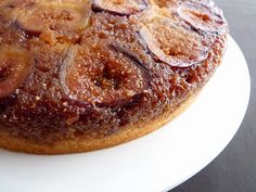 a cake on a white plate sitting on a table