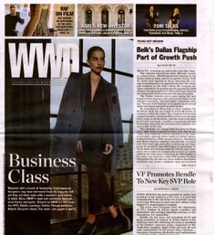 an article in the news about business class, featuring a woman standing on top of a building