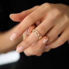 Discover the distinctive elegance of our 14K Gold Baguette Eternity Ring. This stunning piece features unique vertical baguette CZ stones, creating a ladder-like appearance that makes a bold statement. Perfect as a fashionable stacking ring or a standout piece on its own, it brings a modern twist to classic eternity designs. Ideal for those who appreciate unique and dainty jewelry, this ring combines sophistication with contemporary style. Ring Details * Gold KT: 14k Solid Gold (also available in 18K) * Gold Color Options: White, Yellow, Rose Gold * Gemstone: AAA Grade White Cubic Zirconia * Ready to Ship 3-10 Business Days Baguette Eternity Ring, Fashion Ring, Cz Ring, Stacking Ring, Dainty Jewelry, Cz Stone, Stackable Rings, Stacking Rings, Eternity Ring