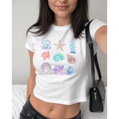 💫These are YOUTH t-shirts made to fit like the perfect nostalgic 90s Y2K baby tee! Step back to the 90s in this comfy tee, designed for a relaxed, hip-length fit that's not cropped. It's perfect if you like a more chill look compared to today's tighter crops. Made from soft 100% cotton, it's super cozy and breathable, with a slight sheerness under bright light. You can check our size chart to find your fit and compare it with your favorite tee. THIS DESIGN FEATURES WEATHERED/DISTRESSED DETAILS. Y2k Printed Streetwear Tops, Y2k Printed Tops For Streetwear, 90s Inspired Summer T-shirt With Letter Print, Y2k Style Fitted Printed T-shirt, Fitted Y2k Style Printed T-shirt, Fitted Y2k Printed T-shirt, Y2k Tops With Sublimation Print For Spring, Y2k Printed Short Sleeve Tops, Y2k Style Printed Tops For Summer