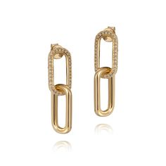 These double paperclip pave earrings are the perfect contemporary accessory; giving you that standout look. .925 sterling silver base with 24k yellow gold vermeil. Also available in sterling silver or 24k rose gold vermeil. · 15 mm oval paperclip links · Top links are fully paved with white topaz semiprecious gemstones · Designed in NYC Elegant Sterling Silver Link Earrings, Gold Paperclip Earrings For Formal Events, Classic Gold Paperclip Earrings, Gold Sterling Silver Box Chain Earrings, Gold Paperclip Shaped Single Earring, Gold Paperclip Shape Single Earring, Yellow Gold Paperclip Earrings For Gift, Gold Single Paperclip Earring, Yellow Gold Link Earrings For Everyday