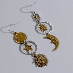 About: Dangle these earrings featuring moon, stars, and sun charms and get some out-of-this-world, celestial vibes! Specs: Metal Type: Zinc alloy Moon Decor, Jewelry Tags, Party Earrings, Moon Stars, Long Pendant, Crystal Gifts, Star Pendant, Sun Moon, Pendant Earrings