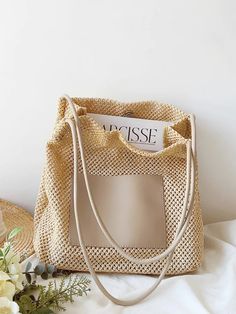 Achieve an elevated and refined look with the Elena Handbags Straw Woven Tote Bag with Leather Accent. Beautifully crafted with a uniquely textured straw weave and leather accents, this luxe tote bag is perfect for carrying your everyday necessities with a timeless sense of chic style. Size: 12.2"H x 11"W x 4.7"D Designer Style ID: 8514 Straw Woven Tote Bag with Leather Accent, Retro Vibes, Summer Bag, Beach Shoulder Bag Chic Beige Crochet Bag With Woven Leather Details, Chic Beige Crochet Bag With Woven Leather, Beige Rectangular Satchel With Braided Handles, Eco-friendly Beige Bags With Braided Handles, Beige Rectangular Straw Bag For Travel, Eco-friendly Satchel Shoulder Bag With Braided Handles, Cream Straw Travel Bag, Trendy Jute Shoulder Bag For Shopping, Trendy Beige Shoulder Bag With Open Weave