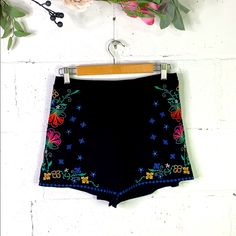 Xhilaration Black Floral Embroidered Shorts Elasticized Waist Size M New With Tags Approximately Measurements Laying Flat Waist 13 1/2 Rise 12 Inseam 3 Black Embroidered Cotton Bottoms, Summer Stretch Bottoms With Floral Embroidery, Stretch Bottoms With Floral Embroidery For Summer, Floral Embroidered Stretch Bottoms For Summer, Black Bottoms With Built-in Shorts For Festival, Black Bohemian Shorts For Spring, Black Bottoms With Floral Embroidery For Summer, Black Floral Embroidered Bottoms For Summer, Summer Stretch Embroidered Bottoms