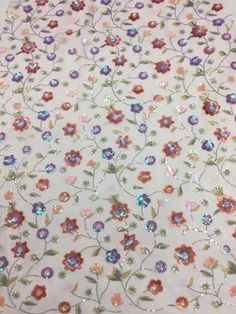 We offer a variety of fashion handmade fabric，those are widely use for wedding dress，garment and fashion cloth. we sell it by yard，our minimum order is 1 yards，and we always package it 15 yards for one roll，the width is about 125cm /48inch Material ： sequins ,mesh ,Rayon,polyester. Symmetrical embroidery floral pattern, with lovely flowers in the middle, scalloped border. You can also cut and use separately. Perfect for dress, tops, wedding veil. You can split the piece up and have one scalloped Multicolor Embroidered Fabric With Sequins For Wedding, Fitted Party Sequin Fabric With Floral Embroidery, Pink Sequin Fabric For Spring Festivals, Glamorous Multicolor Sequin Fabric For Spring, Elegant Pink Sequin Fabric For Summer, Pink Sequin Fabric With Floral Embroidery For Spring, Spring Pink Sequin Fabric With Floral Embroidery, Pink Floral Embroidered Sequin Fabric For Spring, Spring Embellished Multicolor Sequin Fabric