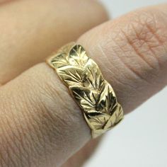 This is a beautifully engraved 14k Yellow Gold Leaf styled ring. READY TO SHIP Size 6 Because of the thickness this ring fits small Engraved Wide Band Yellow Gold Rings, Fine Jewelry Engraved Wide Band Promise Ring, Heirloom Wide Band Engraved Ring For Anniversary, Heirloom Engraved Wide Band Ring For Anniversary, 14k Gold Engraved Ring With Decorative Band For Anniversary, Engraved Wide Band Ring Stamped 14k For Wedding, Wide Band Engraved Ring With Diamond Cut For Anniversary, Yellow Gold Wide Band Engraved Ring For Anniversary, Yellow Gold Heirloom Promise Ring Engraved