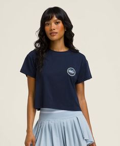 The Wilson Crop Tee is a daily staple that looks amazing with all your high-rise skirts and shorts. Pop it on to revel in the soft feel of tech cotton while giving a nod to heritage with Wilson's original tennis graphics. | Wilson Harper Crop T-shirt - Size M Blue Sporty Tops For Tennis, Sporty Blue Tennis Tops, Summer Tennis Tops With Short Sleeves, Short Sleeve Tennis Tops For Summer, Short Sleeve Summer Tennis Tops, Summer Short Sleeve Tennis Tops, Casual Tennis T-shirt With Moisture-wicking, Casual Moisture-wicking Tennis T-shirt, Sporty Tennis Tops For Summer