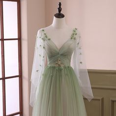 Custom size and custom color are available, there is no extra payment for custom size or custom color. Product Information: Dress Number: #D2WK, Material: Tulle, Silhouette: A-line Color: Green, Hemline: Floor Length, Back Details: Lace-up Delivery times: Processing time: 2-3 weeksShipping time: 3-5 working days Rush Order Rush order service is available. For rush order, you can receive your order in 2 weeks. Custom Measurements For custom size, please leave us the following measurements in the Party Dress Green, Flower Prom Dress, Green Formal Dresses, Tulle Party Dress, Green Tulle, Floor Length Prom Dresses, Evening Dress Floor Length, Long Sleeve Prom, Party Dress Long Sleeve