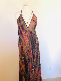 A beautiful Boho Goddess dress , handmade in India from a Vintage Silk Sari , so completely unique . This dress flows loosely from the shoulders , with very long adjustable halter straps, so you may have the neckline as high or low as you prefer . The ties can be left loose , or adjusted under the bust / around the waist , to create different , more fitted silhouettes . The fabric is tie dyed by hand , in a beautiful mix of pink and purples . The size will fit and flatter UK 8 to 16 , US 4 to 12 Loose Boho Dress, Hippie Dresses Boho, Halter Party Dress, Backless Halter Top, Boho Tie Dye, Fantasy Wardrobe, Hippy Chic, Maxi Dress Long, Goddess Dress