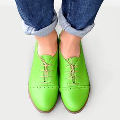 Leather; upper & lining Man-made sole 2.5 cm / 1.0" heel height Handcrafted in Europe Materials: A celebration of bright spring colours, these oxford shoes are built with a slim silhouette design and classic punched detailing. Wear these lace-ups with everything from tailoring to dresses to add a dose of androgynous cool. Material: Tropic Green Soft Leather Laces: Beige & Orange (bonus) Decorations: Brogues, Perforations Sole: Beige #1685 CUSTOMIZEBANNER460991377_ Green Flats With Rubber Sole And Round Toe, Green Closed Toe Flats With Rubber Sole, Classic Flat Heel Lace-up Shoes For Spring, Casual Green Leather Shoes With Almond Toe, Green Round Toe Leather Shoes For Derby, Green Leather Round Toe Shoes For Derby, Green Leather Shoes For Derby With Round Toe, Spring Leather Shoes With Stitched Sole, Spring Leather Shoes With Stitched Sole And Plain Toe