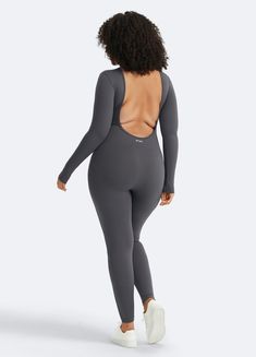 Turn heads with our Open Back Jumpsuit, designed for both comfort and style. Stay chic and cool with a breathable, open back design and soft, stretchy fabric. Perfect for casual outings, special occasions, and anything in between. Casual High Stretch Gray Bodysuit, Casual Gray High Stretch Bodysuit, Casual Long Sleeve Jumpsuits For Gym, Chic Stretch Jumpsuits And Rompers For Workout, Casual Long Sleeve Jumpsuits And Rompers For Workout, Casual Jumpsuits And Rompers For Gym In Spring, Casual Long Sleeve Workout Jumpsuits And Rompers, Casual Compressive Jumpsuits And Rompers For Workout, Casual Workout Jumpsuits And Rompers With Long Sleeves