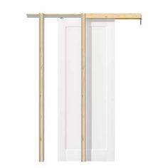 a white door with two wooden bars on it