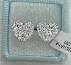 Beautiful Heart Diamond Stud Earrings White Gold. Excellent craftsmanship, the diamonds are very sparkling. Very pretty heart shaped earrings. Sits nice and flat on the ear. The diamonds are set close together, no gaps between the diamonds. The backings have two notches for a secure fit. These diamond earrings are simply classy and beautiful. Heart measures about 10.2 x 11.1mm. These earrings are nice size, not too big or small. Give the gift of love with these stunning earrings. Genuine natural Luxury Heart Cut Diamond Earrings, Luxury Double Heart Earrings For Valentine's Day, Luxury Heart Earrings For Wedding On Valentine's Day, Luxury Heart Earrings For Valentine's Day Wedding, Gia Certified Heart-shaped Diamond Jewelry, Luxury Heart Cut Earrings With Diamond Accents, Luxury Heart-shaped Diamond Earrings With Prong Setting, Luxury Heart-shaped Diamond Earrings, Luxury Heart-shaped Brilliant Cut Earrings