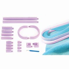 a set of hair brushes and combs sitting on top of a blue towel next to it's contents